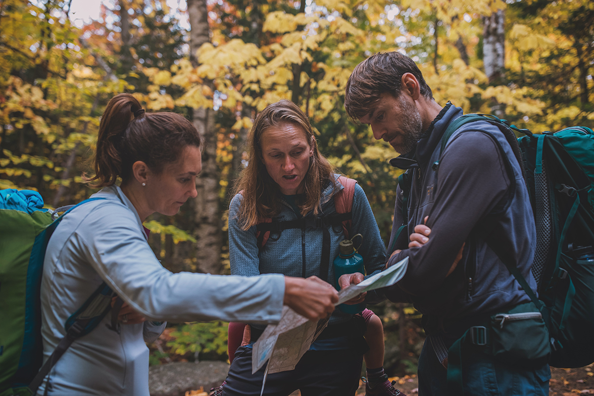 Hikers looking at a map