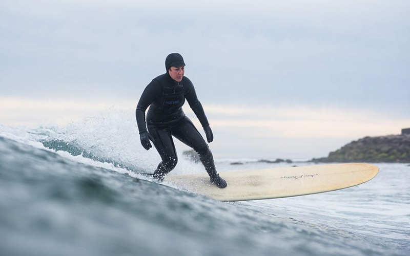 A surfer in Narragansett